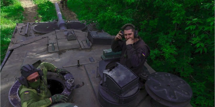 Ukrainian soldiers in a Leopard 2A6 tank near the frontline in Donetsk Oblast, May 12, 2024
