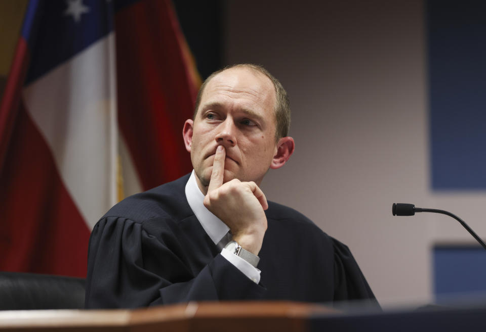 Fulton County Superior Judge Scott McAfee listens during a hearing in the case of State of Georgia v. Donald John Trump in Atlanta, Monday, Feb. 12, 2024. (Alyssa Pointer/Pool Photo via AP)