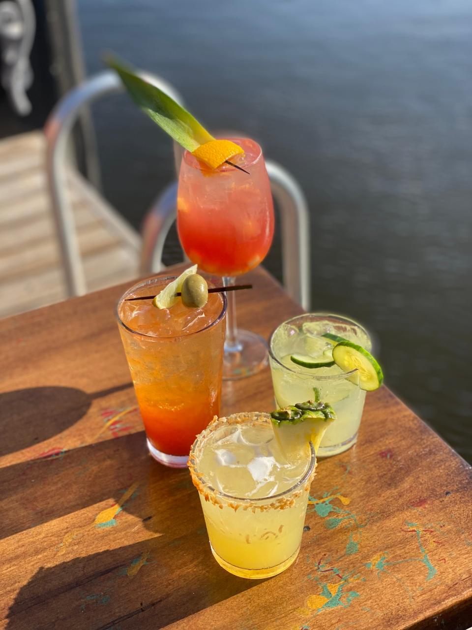 Cocktails on the water at Del Fuego? Yes, please! Try their (clockwise from top) Rose sangria, cucumber crush, pineapple margarita or the Del Fuego bloody maria.