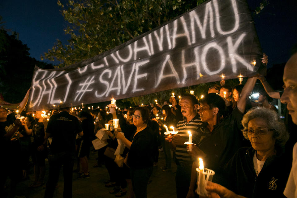 <p>Supporters of Jakarta’s former governor Basuki Tjahaja Purnama, popularly known as ‘Ahok’, gather to show their support in Denpasar, Bali, Indonesia, May 11, 2017. Hundreds of Ahok supporters gathered and lit candles to express their support and demand the releaser of Basuki Tjahaja Purnama. An Indonesian court had sentenced him to two years in jail for blasphemy. (Photo: Made Nagi/EPA) </p>