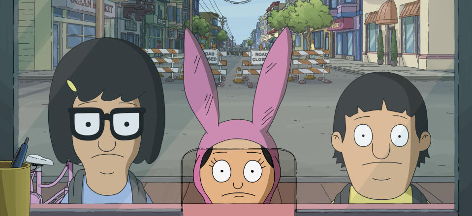 This image released by 20th Century Studios shows, from left, Tina Belcher, voiced by Dan Mintz, Louise Belcher, voiced by Kristen Schaal, and Gene Belcher, voiced by Eugene Mirman, in a scene from "The Bob's Burgers Movie." (20th Century Studios via AP)