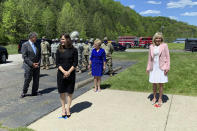 First lady Jill Biden, right, arrives at a vaccination clinic Thursday, May 13, 2021, at Capital High School in Charleston, W.Va. Arriving with her are actress Jennifer Garner, center, along with U.S. Sen. Joe Manchin, left, and his wife, Gayle Manchin. . (Kenny Kemp/Charleston Gazette-Mail via AP)