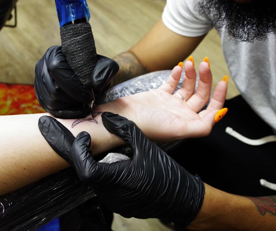 Close up of the tattoo artwork of Patrick Martins on the arm of Amanda Pratti of Whitman at the K&M Tattoo Studio in Brockton, on Friday, Oct. 13, 2023.