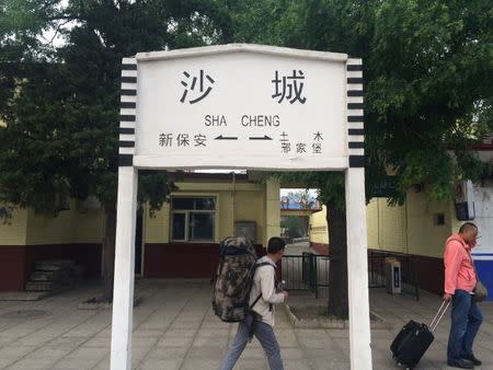 A sign of Shacheng is seen at its railway station in Shacheng, Hebei Province, China, May 11, 2016. REUTERS/Sue-Lin Wong
