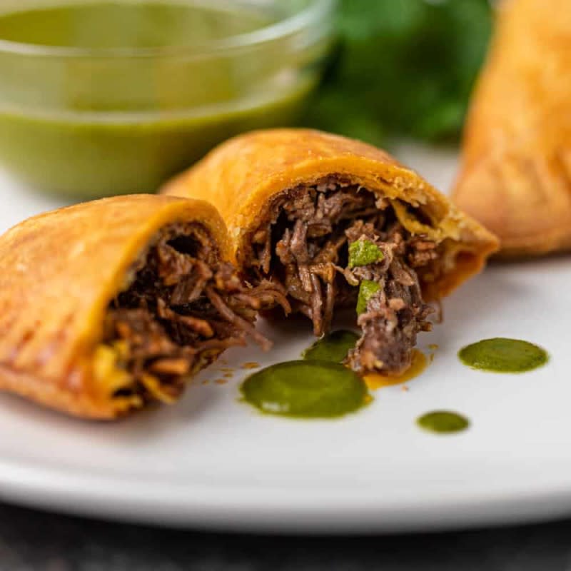 <p>Kevin is Cooking</p><p> Filled with slow cooker tri-tip and salsa verde.</p><p><strong>Get the recipe:</strong> <a href="https://keviniscooking.com/beef-empanadas/" rel="nofollow noopener" target="_blank" data-ylk="slk:Beef Empanadas;elm:context_link;itc:0;sec:content-canvas" class="link ">Beef Empanadas</a></p>