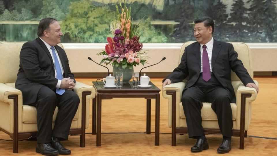 Mike Pompeo y Xi Jinping