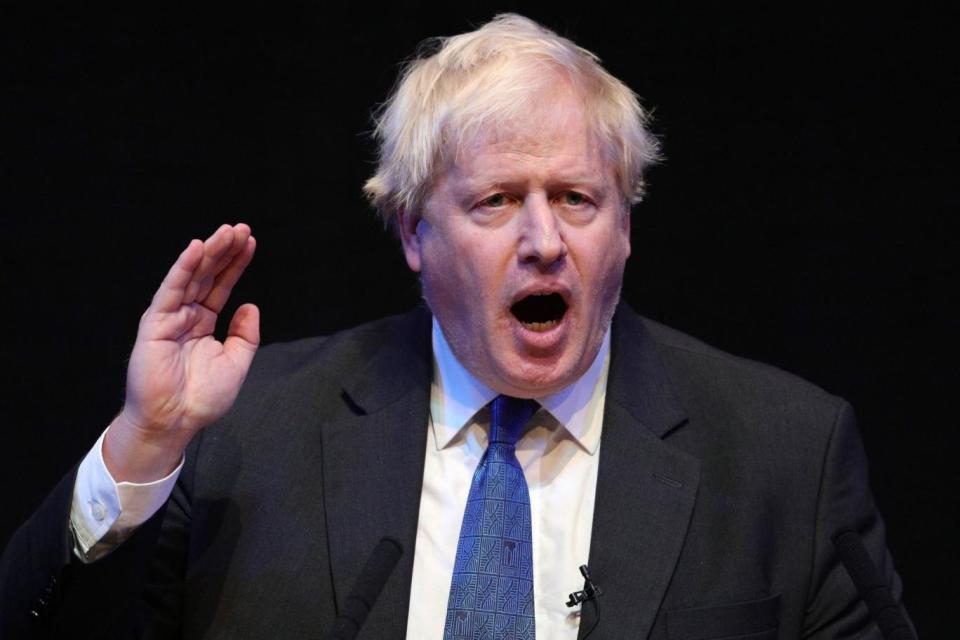 Boris Johnson speaking at the Conservative Party annual conference last month (PA)