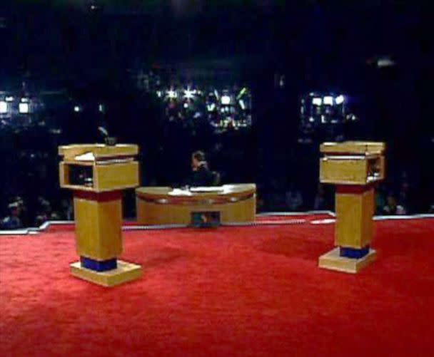 PHOTO: Empty podiums are set up prior to a debate in 2004. (AP, FILE)