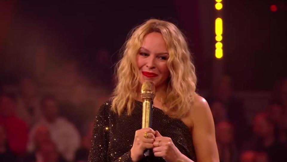 Is it Kylie Minogue behind the mask? (An Audience With Kylie/ITV)