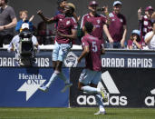 Colorado Rapids attacker Gyasi Zardes, left, celebrates after scoring on a penalty kick as defender Auston Trusty joins in during the first half of an MLS soccer match against Los Angeles FC, Saturday, May 14, 2022, in Commerce City, Colo. (AP Photo/David Zalubowski)