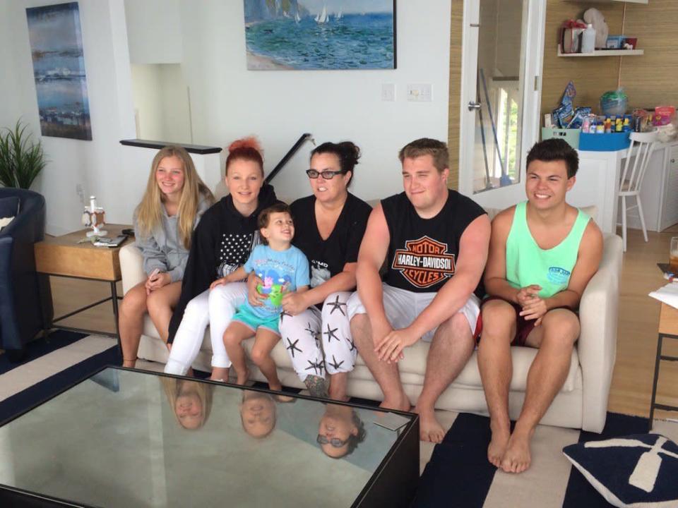 The former co-host of The View, 54, shared a rare photo of all five of her kids — (from left to right) Vivienne, Chelsea, Dakota, Parker, and Blake — together in the same spot. “The 5 and me,” she captioned this shot of the group, which barely fit on the couch of the airy beach house. Rosie herself seemed to adopt the vacation vibe, if her starfish pants are any indication. The pants also showed off her extensive ankle tattoo. (Photo: Twitter)