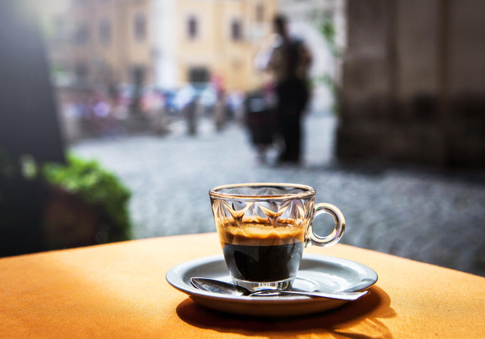 A cut of espresso on a table outdoors
