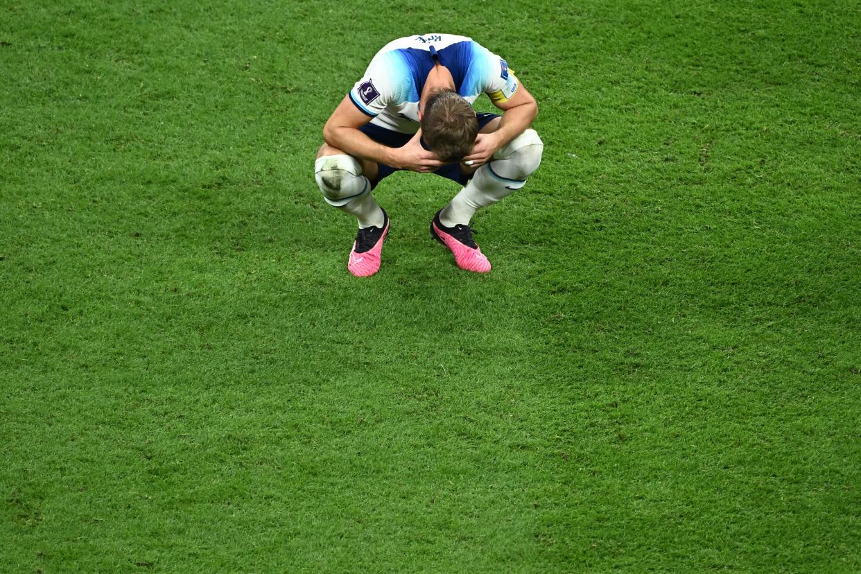 TOPSHOT - England's forward #09 Harry Kane reacts to his team's loss in the Qatar 2022 World Cup quarter-final football match between England and France at the Al-Bayt Stadium in Al Khor, north of Doha, on December 10, 2022. (Photo by Jewel SAMAD / AFP) (Photo by JEWEL SAMAD/AFP via Getty Images)