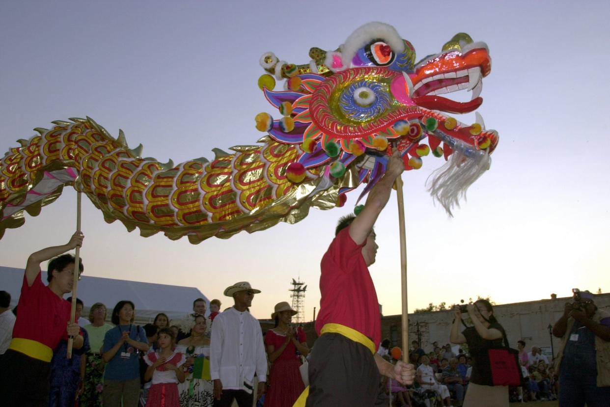 In this photo from 2001, the Chinese Consolidated Benevolent Society entertained the crowd at the Arts in the Heart of Augusta festival with a 50-foot dragon.