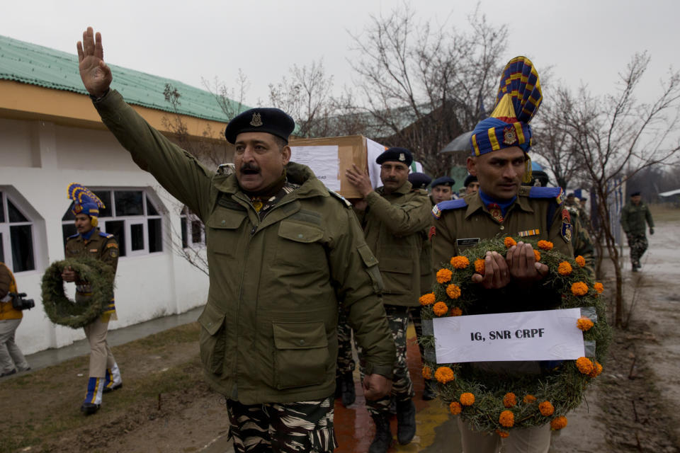 An Indian paramilitary officers shouts slogans during a wreath-laying ceremony for fallen colleagues at a base camp on the outskirts of Srinagar, Indian controlled Kashmir, Saturday, March 2, 2019. Two paramilitary soldiers and two counterinsurgency police officials were killed in a gunbattle with militants in Indian-controlled Kashmir, while troops fatally shot a civilian during anti-India protests, Indian police said Saturday.(AP Photo/ Dar Yasin)