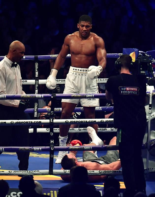 Joshua stands over his fallen opponent. Pic: Getty