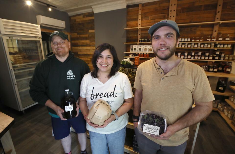 Co-owners Chad Flint, Jen Dondero and Ben Reiter inside Provisions, a general store specializing in local products, on Culver Road in Rochester.