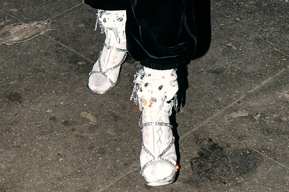 A closer view of Rita Ora’s white boots. - Credit: CelebCandidly/MEGA