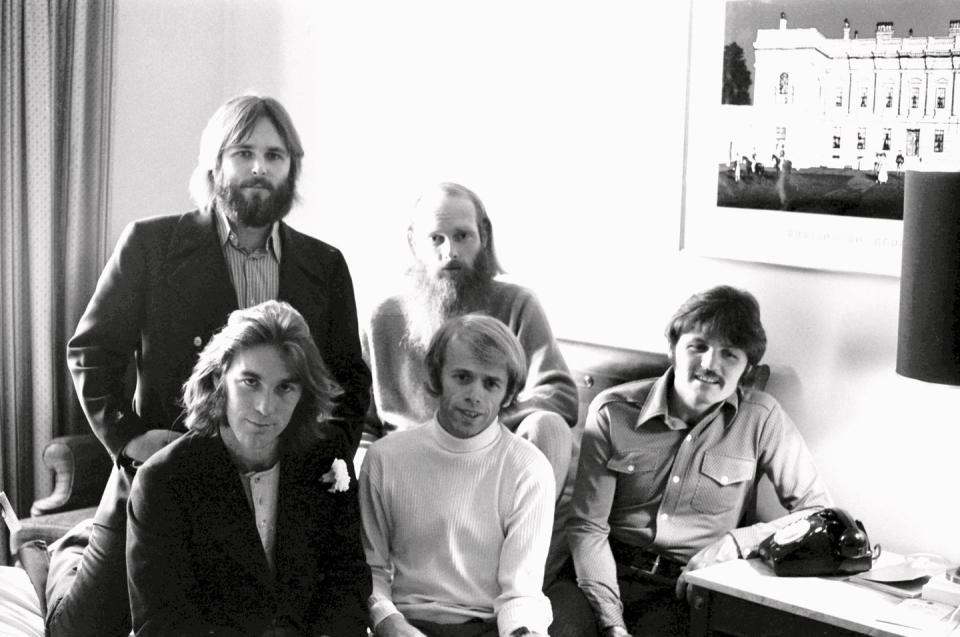 <p>The Beach Boys pose in a green room backstage before a concert in December 1970. </p>