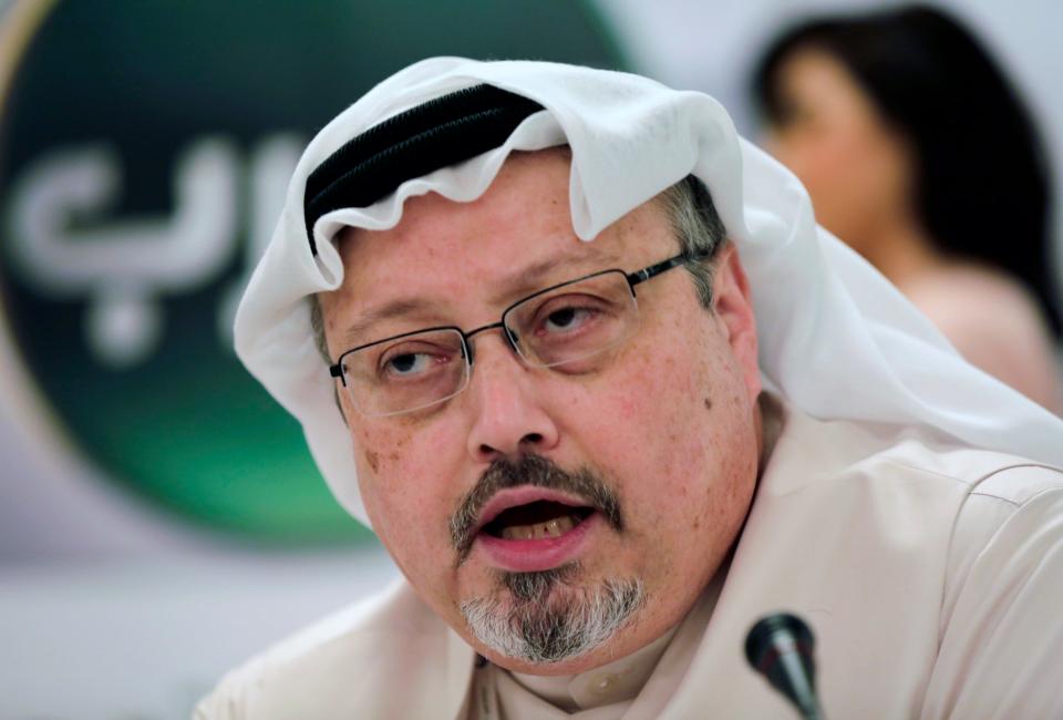 In this 2014 file photo, Saudi journalist Jamal Khashoggi speaks during a press conference in Manama, Bahrain.