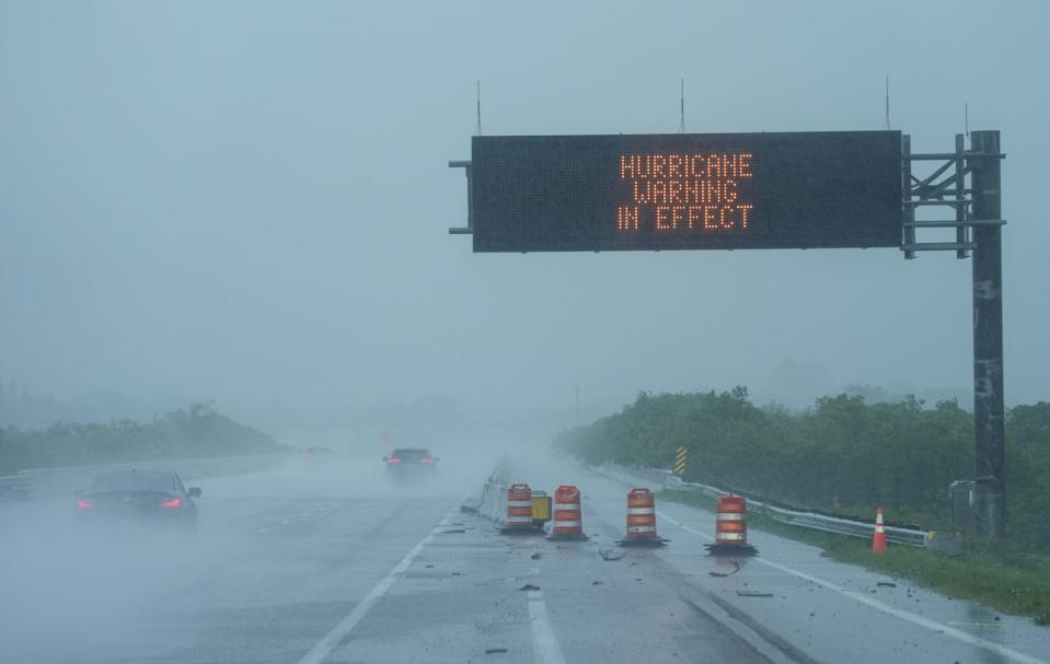 a view of a sign as hurricane milton bears down on the gulf coast in sarasota, florida, united states on october 9, 2024