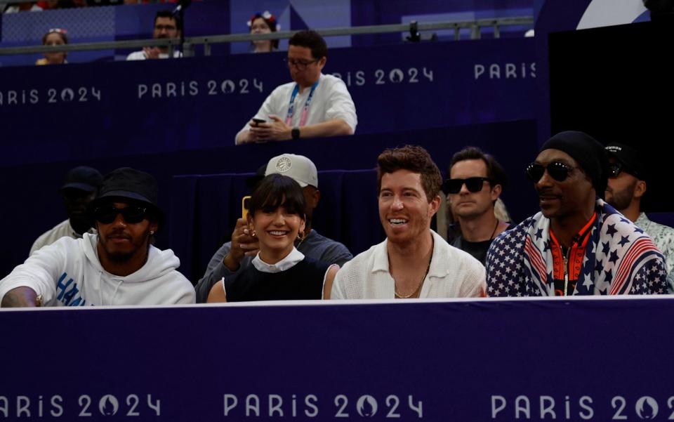 Snoop Dogg and Formula One driver Lewis Hamilton (far left) attend the fencing at the Paris 2024 Olympic Games/