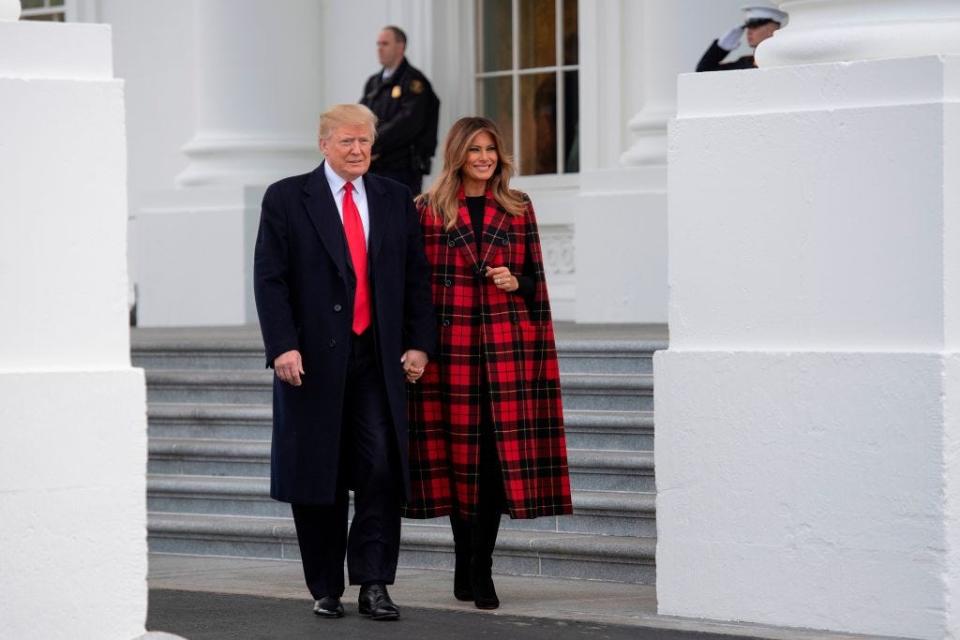 Donald Trump and Melania Trump receive the National Christmas Tree in 2018.
