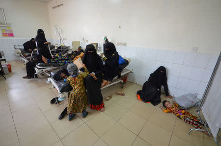 FILE PHOTO: A girl infected with cholera lies on the ground of a hospital room in the Red Sea port city of Hodeidah, Yemen May 14, 2017. REUTERS/Abduljabbar Zeyad/File Photo