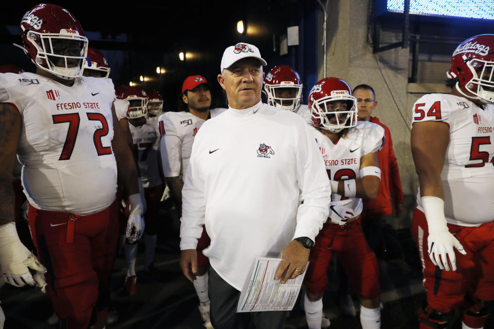 Fresno State head coach Jeff Tedford waits with his players to take the field in the second half of an NCAA college football game against Air Force Saturday, Oct. 12, 2019, at Air Force Academy, Colo. (AP Photo/David Zalubowski)