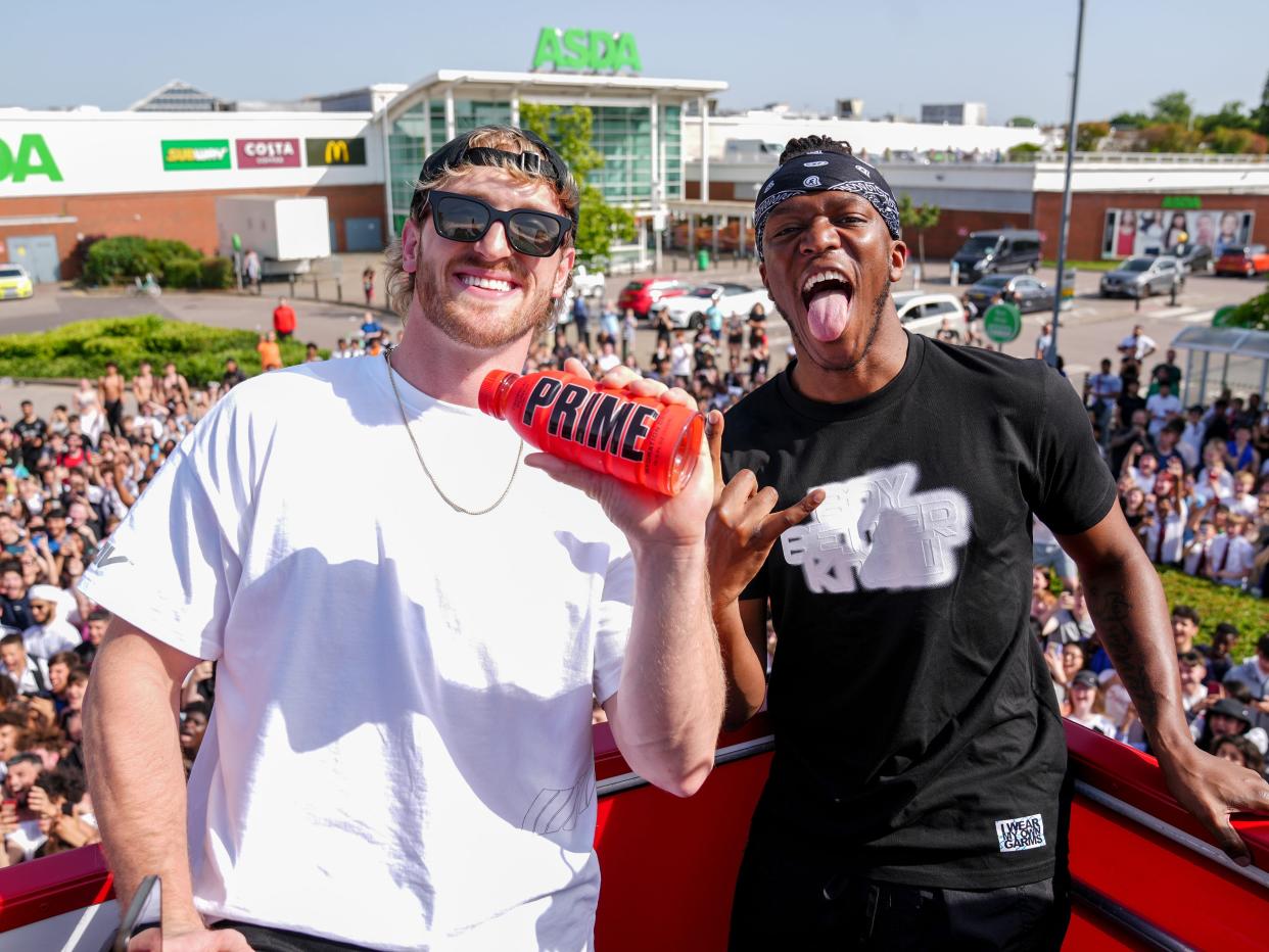 Logan Paul and KSI with a bottle of Prime