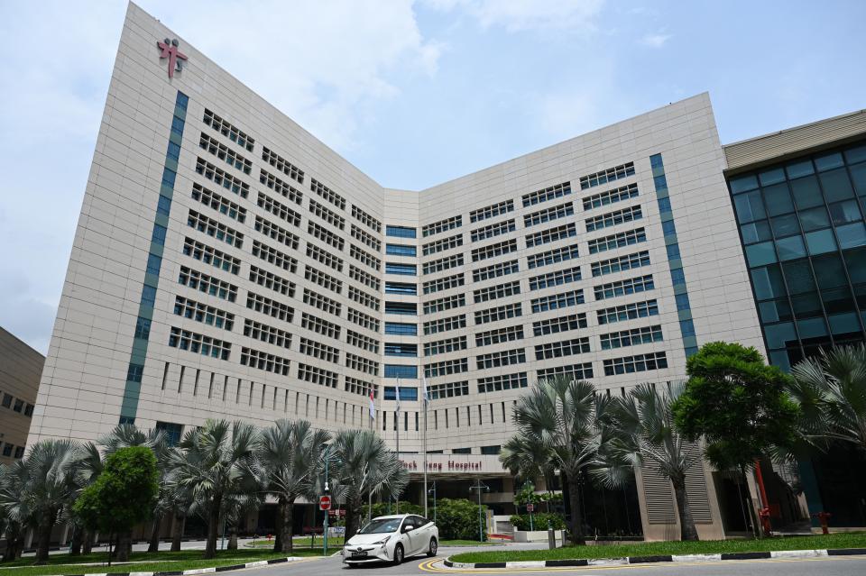 The exterior of Tan Tock Seng Hospital is pictured in Singapore on April 30, 2021, as authorities sought to contain the spread of the Covid-19 coronavirus after a cluster of cases were detected at the facility. (Photo by ROSLAN RAHMAN / AFP) (Photo by ROSLAN RAHMAN/AFP via Getty Images)