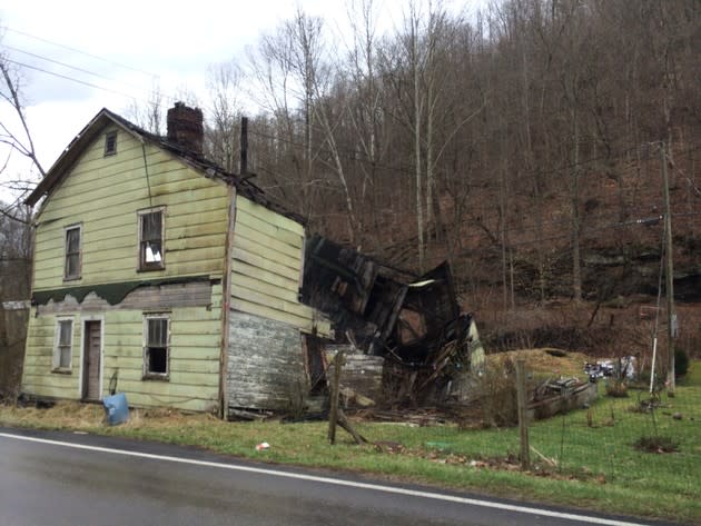 Dilapidated homes like this one dot the road to Cromona. (Alana Semuels)