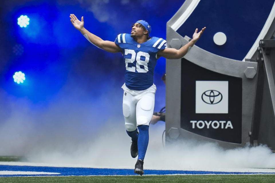 Indianapolis Colts running back Jonathan Taylor (28) runs out onto the field before an NFL football game against the Tennessee Titans, Sunday, Oct. 8, 2023, in Indianapolis. (AP Photo/Michael Conroy)