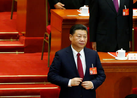 China's President Xi Jinping attends the closing session of China's National People's Congress (NPC) at the Great Hall of the People in Beijing, China, March 15, 2017. REUTERS/Thomas Peter