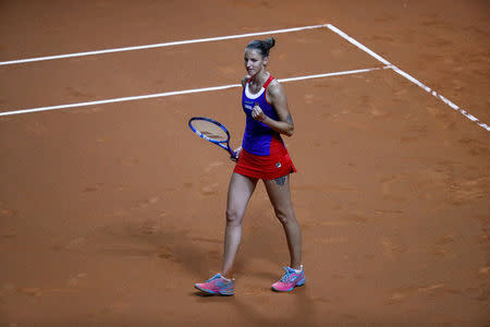 Tennis - Fed Cup - World Group Semi Final - Germany vs Czech Republic - Porsche Arena, Stuttgart, Germany - April 21, 2018 Czech Republic's Karolina Pliskova celebrates after winning her match against Germany's Angelique Kerber REUTERS/Kai Pfaffenbach