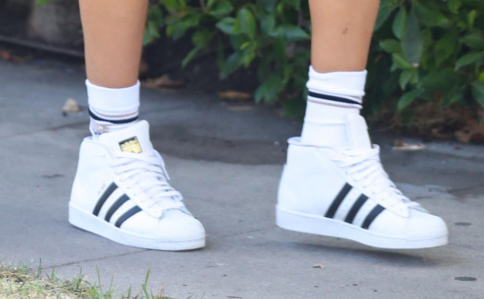 A closer look at Olivia Culpo’s Adidas sneakers. - Credit: BG023/Bauergriffin.com / MEGA