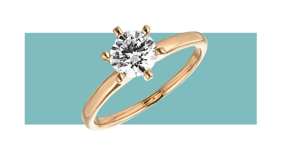 You can’t go wrong with a classic, like the Traditional Solitaire Engagement Ring from Miadonna.