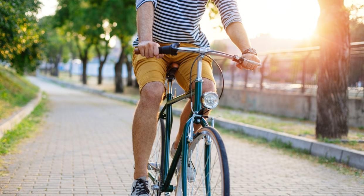 Physical activity man on bike. (Getty Images)