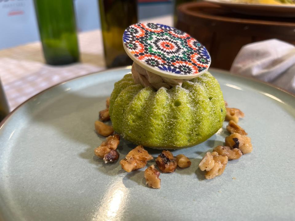 Pistachio cake with cinnamon pastry cream and candied walnuts will be available at Moroco's Tangerine Cafe during the 2023 Epcot International Food and Wine Festival.