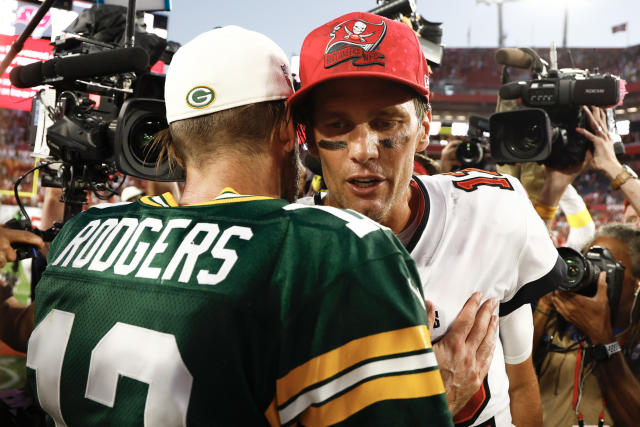 Aaron Rodgers and Tom Brady meet after Bucs-Packers game in 2022.