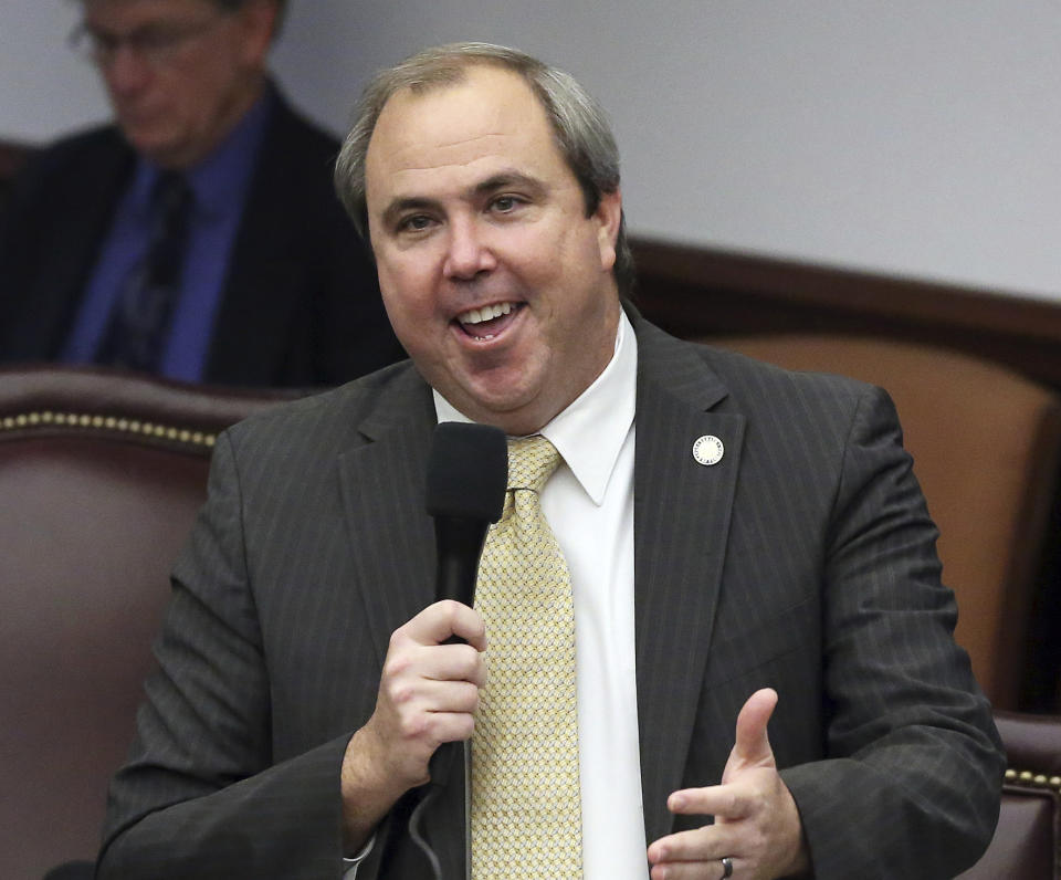 FILE - In this March, 27 2019, file photo, Sen. Joe Gruters, R-Sarasota, speaks during session in Tallahassee, Fla. The divide between blue and red states with large immigrant populations is stark as both prepare for a Census that could ask about citizenship for the first time in 70 years. Republican lawmakers, including Gruters, in several states with large immigrant populations praised the Trump administration for fighting to include the question and wondered whether immigrants should even be included in the count. They were unconcerned about the prospect for an undercount. (AP Photo/Steve Cannon, File)