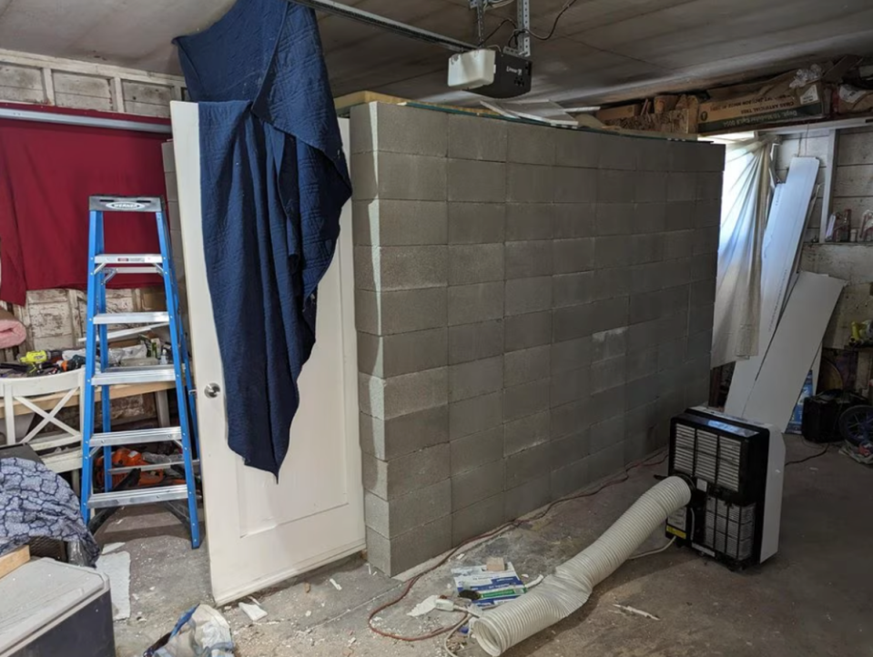 The makeshift cell constructed using cinderblocks in the garage in the home in Klamath Falls (FBI)