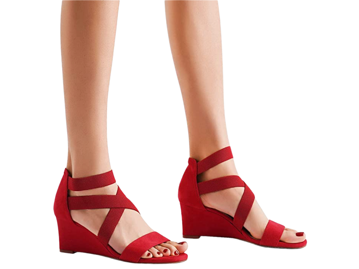 Red strappy sandals on a model.