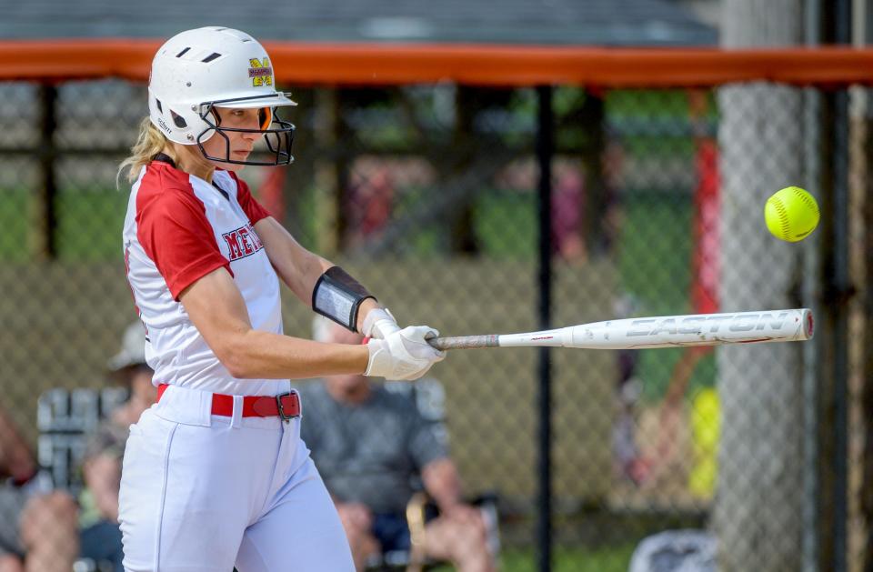 Metamora's Kayla Pacha connects on a Bloomington pitch in the Class 3A softball sectional semifinals Tuesday, May 31, 2022 at Jan Smith Field in Washington. The Redbirds defeated the Purple Raiders 7-1 to advance to the sectional title game against East Peoria at 4:30 p.m. Friday in Washington.