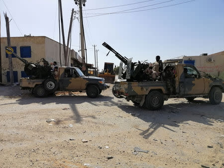 Troops from eastern Libyan forces are seen in Ain Zara, south of Tripoli, Libya April 11, 2019. Picture taken April 11, 2019. REUTERS/Stringer