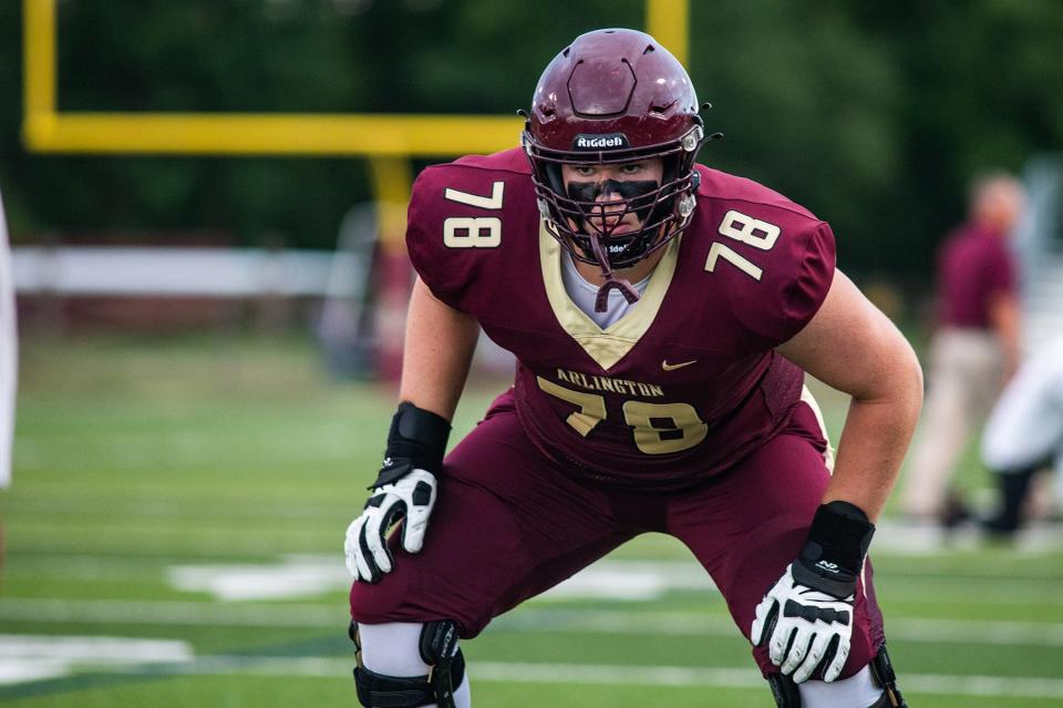 Arlington offensive lineman Colin Cubberly gets into his stance before a Sept. 12, 2022 game against Suffern.