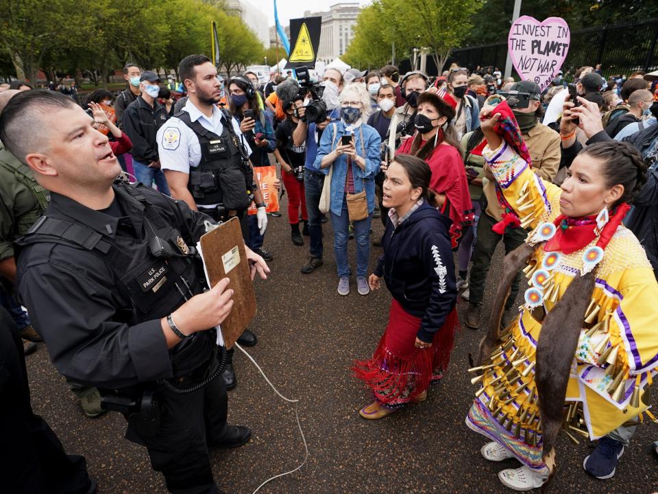 Indigenous Activist march outside the White House for Climate action