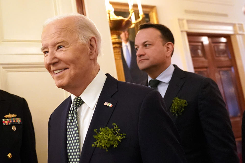 President Joe Biden, left, and Ireland's Prime Minister Leo Varadkar arrive at a St. Patrick's Day brunch with Catholic leaders in the East Room of the White House, Sunday, March 17, 2024. (AP Photo/Stephanie Scarbrough)