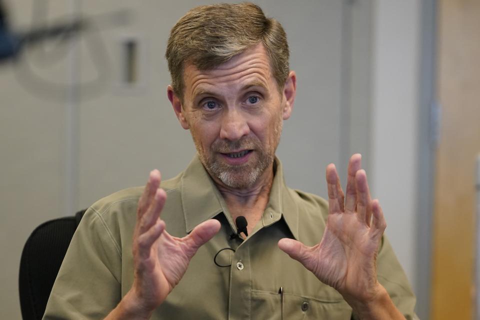 Keith Heaton, the executive director of the Seven County Infrastructure Coalition, discusses the Uinta Basin Railway proposal on Tuesday, July 18, 2023, in Salt Lake City. He and the coalition of rural conservative counties see the rail as an economic development opportunity but face pushback amid growing questions about the future of oil and gas. (AP Photo/Rick Bowmer)