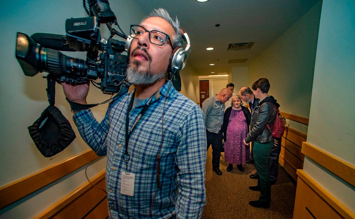 Aaron Dean’s family waits to go back inside the courtroom in the Tim Curry Criminal Justice Center for the verdict in Dean’s murder trial Thursday, Dec. 15, 2022.